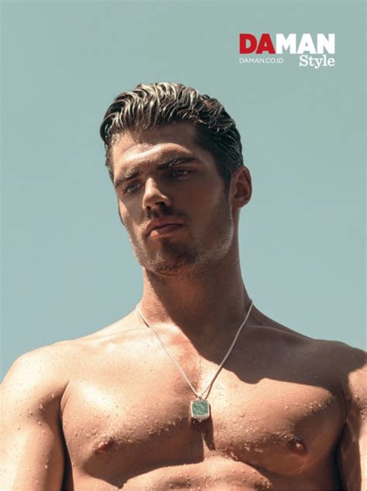 Brian Shimansky is shirtless, showing his ripped body.