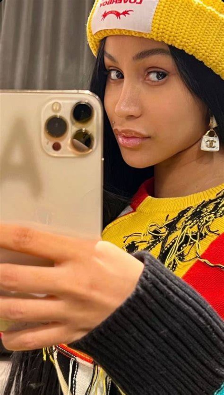 Cardi B taking selfie in mirror