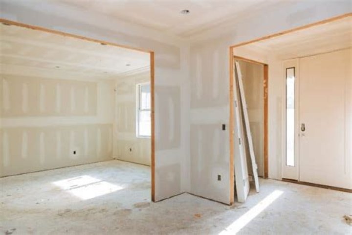 Do interior doors go in before drywall?