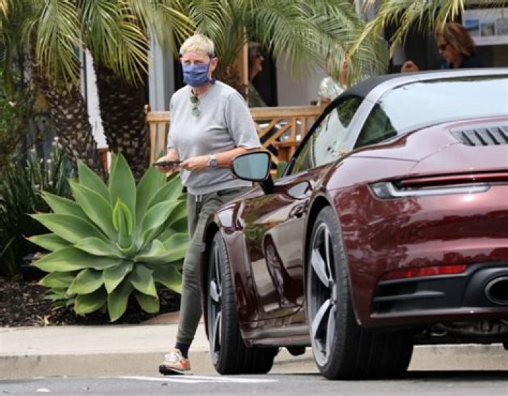 Ellen DeGeneres with her Porsche Carrera