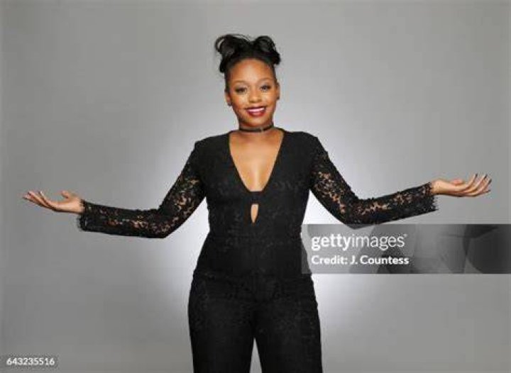 Jazz Raycole posing for a photo shoot after completing her daily workout