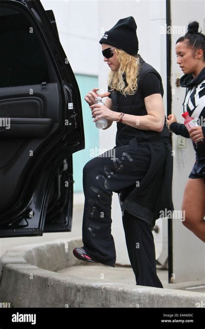 Madonna is seen leaving the Palazzo Parigi hotel in on November 25, 2023 in Milan, Italy.