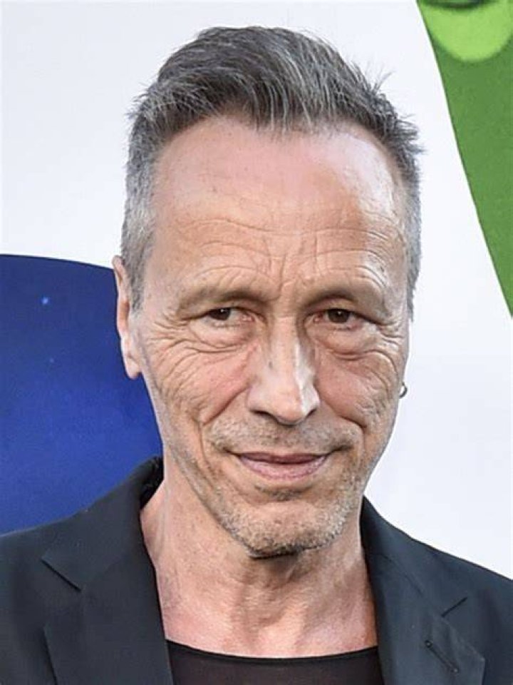 Michael Wincott posing for a photo shoot.